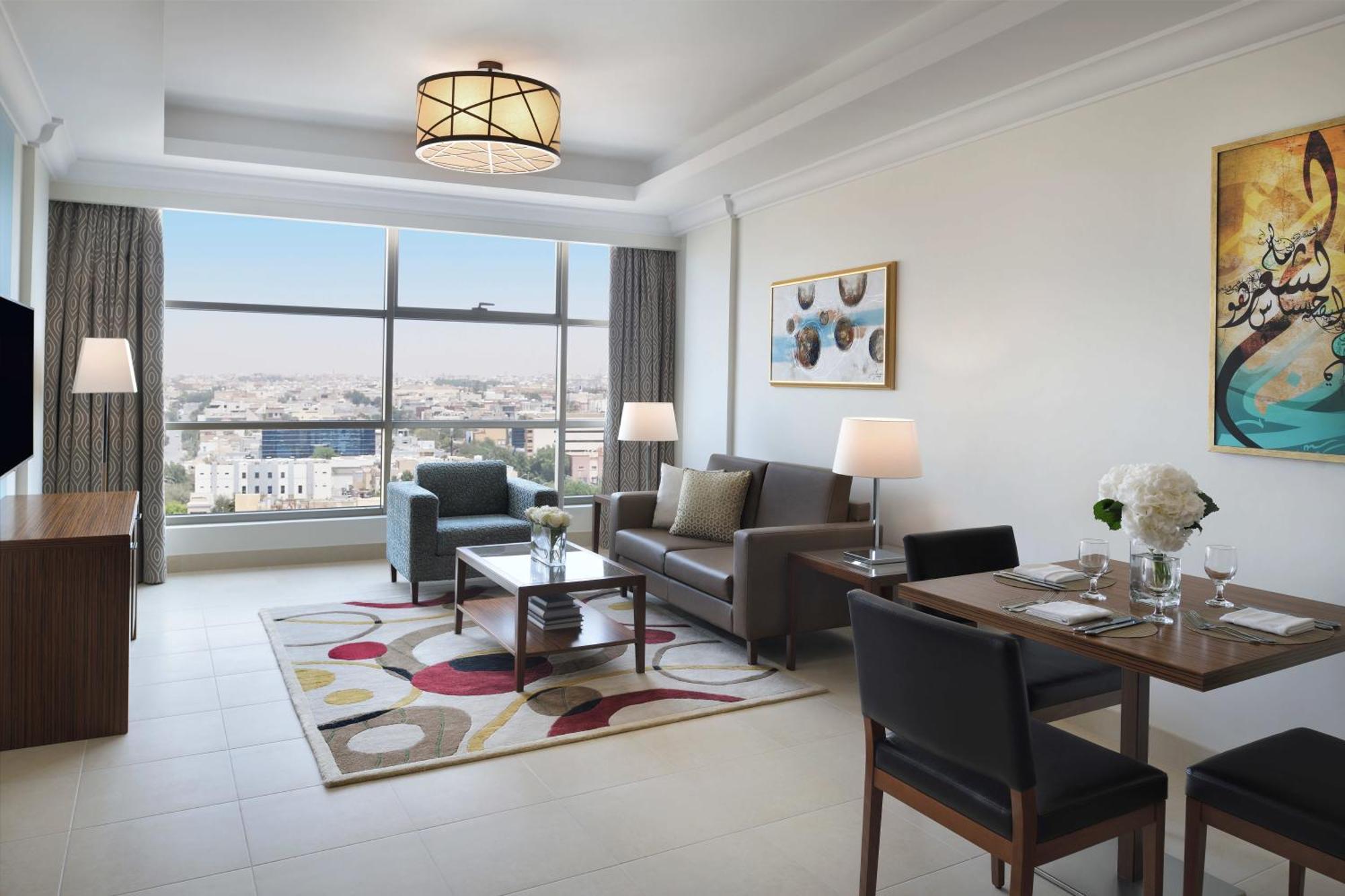 Marriott Executive Apartments Al Khobar Exteriör bild A living room at the hotel